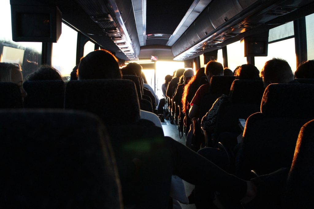 people riding on a bus